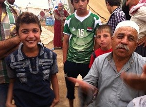Members of Kakai religious community live in refugee camps following the ISIS invasion. Members of Kakai religious community live in refugee camps following the ISIS invasion.