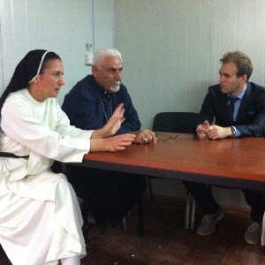 Sister Diana and the Syrian Catholic Archbishop of Mosul, Yohanna Petros Mouche. Sister Diana and the Syrian Catholic Archbishop of Mosul, Yohanna Petros Mouche.