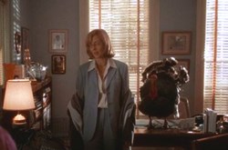C.J. Cregg (Alison Janney) deals with the turkey in 'The West Wing'