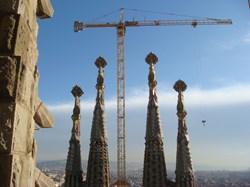 Cranes tower over La Sagrada Familia, the unfinished church in Barcelona designed by Antonio Gaudi.