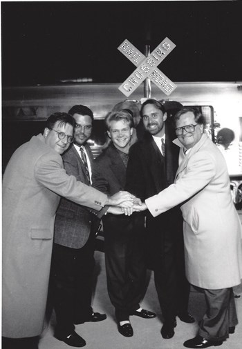 Billy Ray Hearn (right) and his son Bill Hearn (left) celebrate Steven Curtis Chapman's re-signing to Sparrow Records. Billy Ray Hearn (right) and his son Bill Hearn (left) celebrate Steven Curtis Chapman's re-signing to Sparrow Records.
