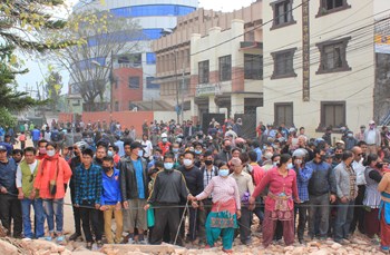 Anxious relatives and onlookers at the Kapan church collapse.