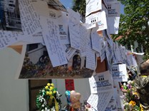 Memorial prayers in front of the church.