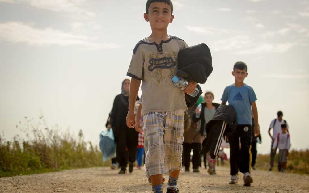 Refugees arrive at the border of Croatia and Serbia.