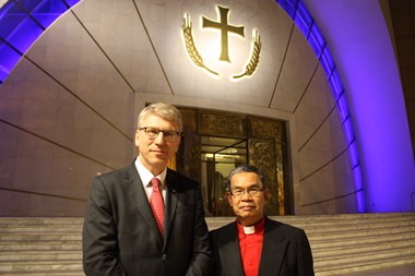 Leaders of the World Evangelical Alliance, Efraim Tendero (right), and World Council of Churches, Olaf Tveit (left), in front of Orthodox cathedral in Tirana.