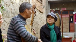 Wu Man and Zhang Ximin in 'The Music of Strangers'