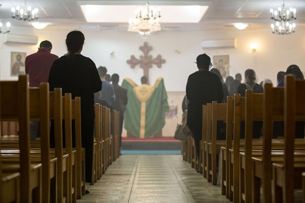 Father Daniel leads an Aramaic worship service at Mar Elia Church in Erbil. Father Daniel leads an Aramaic worship service at Mar Elia Church in Erbil.