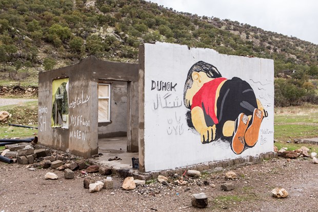 A mural of Alan Kurdi, a Syrian three-year-old whose drowning became a symbol of the refugee crisis, on the road to Dohuk.