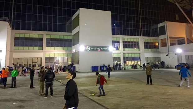 Refugees play soccer at Galatsi Park, Athen's former Olympic stadium.