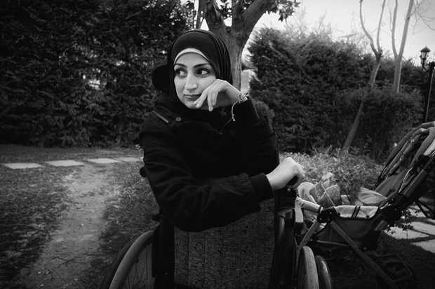 Athens: At Bethel, a retreat center and hostel in Athens run by Greek Scripture Union, Syrian and Yemeni refugees have been invited for excercise,  food, and rest before their journey toward Germany begins. This woman is in a wheelchair after being injured by a car bomb in Syria.