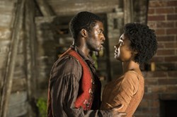 Malachi Kirby and Emayatzy Corinealdi in 'Roots'