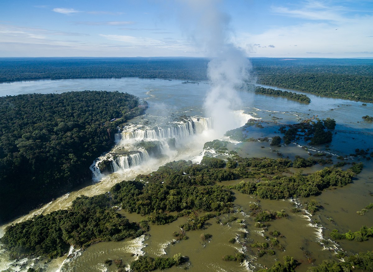 Iguazu Falls, between Brazil and Argentina, is one of the largest waterfalls in the world. Iguazu Falls, between Brazil and Argentina, is one of the largest waterfalls in the world.