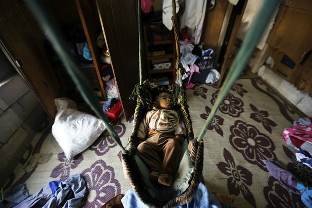 Youssef was born in this tent settlement four months ago.