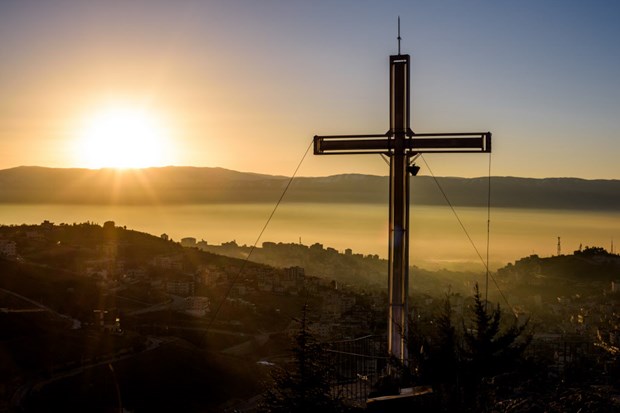 The sun rises over Zahle and the Bekaa Valley.