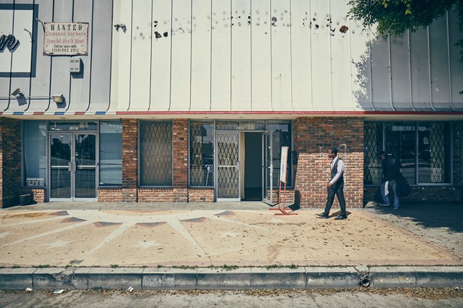 Mario Salamanca's church meets in an unmarked storefront in Compton, California.