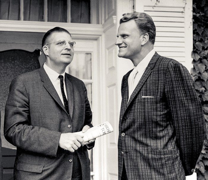 Founder Billy Graham with Carl F.H. Henry, editor, who is holding the first issue of Christianity Today.