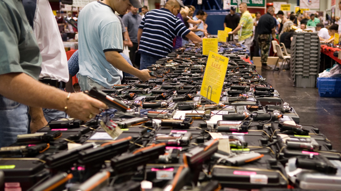 Packing in the Pews: The Connection Between God and Guns Packing in the Pews: The Connection Between God and Guns