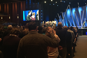 Members and elders pray for the Hybels family. Members and elders pray for the Hybels family.