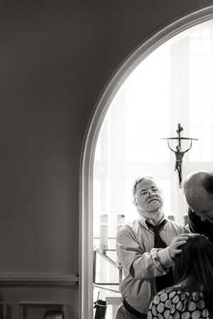 Fritz Schloss, a member of L’Arche in Washington, DC, regularly offers parishioners healing prayer at St. Mary’s Episcopal Church in Arlington, Virginia.