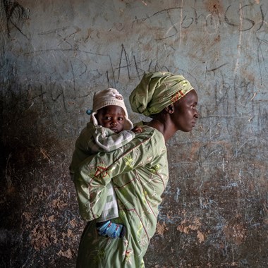 A displaced mother and child at the Stefanos transition camp in Jos. A displaced mother and child at the Stefanos transition camp in Jos.
