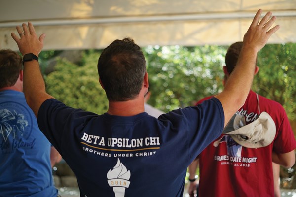 Beta Upsilon Chi brothers worship together in the Old City of Jerusalem